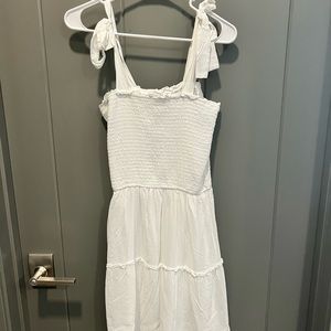 BRIDES! Never worn. Adorable white dress with ties in shoulder.